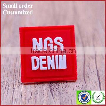 Private luxury square red silicone pvc label for suits jeans