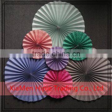 Birthday party decoration elegant folded paper wheels backdrop