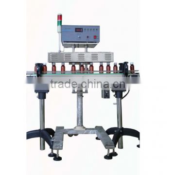 Automatic electromagnetism inductor aluminum foil sealing machine