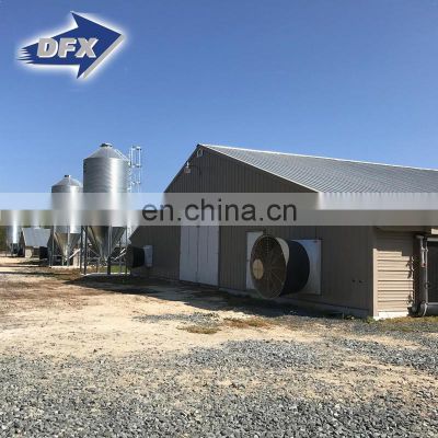 steel poultry house metal building to contain breeding equipments layer cages and drinkers and feeders