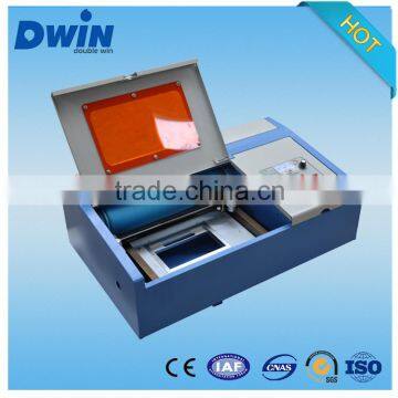 Is suitable for different stamp materials such as plastic Low cost mini laser machine