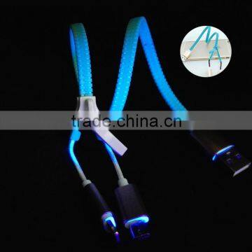 alibaba super bass stereo glow earbuds fluorescence glowing zipper earphone for smartphone