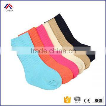 High quality solid color autumn winter thick thermal long sport socks kids children