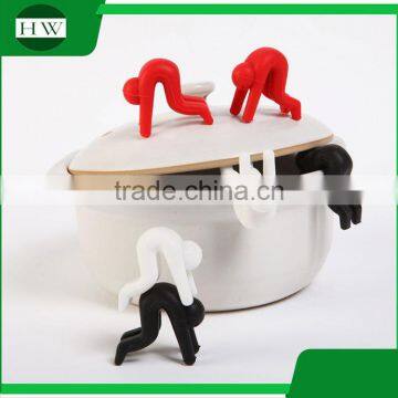 Multipurpose Eco Silicone Person Phone Tableware Raise up Anti Overflow Pot Lid Holder photo-5