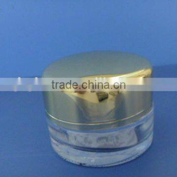 Clear face cream jar with gold alumite cap