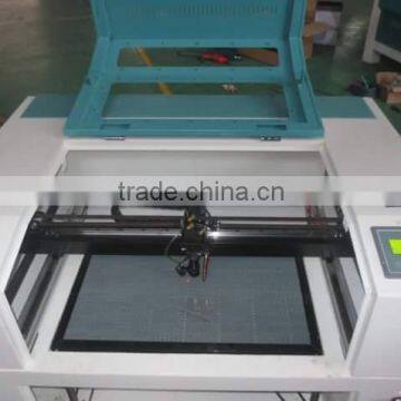 6090 laser engraver speedy 100 price co2 laser engraving cutting machine 40w with up and down platform