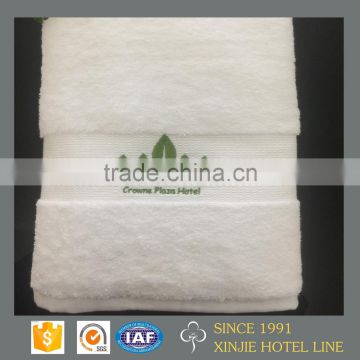 China factory supply 70*140 cotton white embroidery dobby towel for hotels