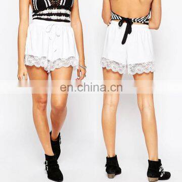 Pretty apparel online jersey drawstring waistband lace trim white mini shorts