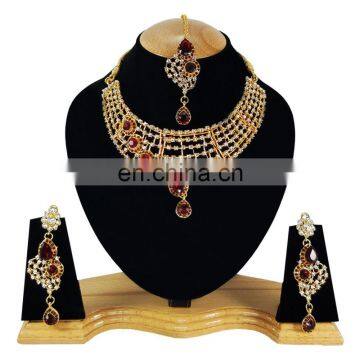 One Sided designer Dark Red Color Stone Gold Plated Kundan Zerconic Necklace Earrings Tikka