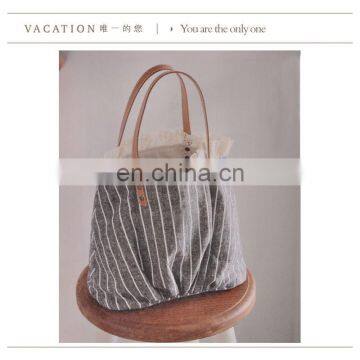 Elegant canvas bag with leather