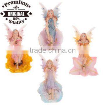 polyresin flower fairy sitting on flower head