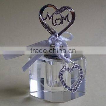 small empty crystal perfume bottle with jewelled metal alloy handle for mother's day