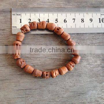 skull wood bead bracelet cheap beaded bracelet elastic wooden skull bead bracelet for promotion