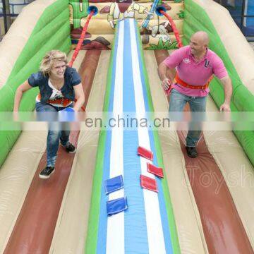 Western Theme Inflatable Bungee Run Wipeout Sport Game For Sale