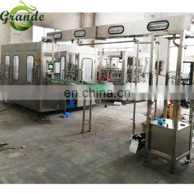 2021 GRANDE Fully Automatic Juice Filling Production Line 3In 1 and 4 In 1 Various Water Juice Carbonate Filling Machine photo-4