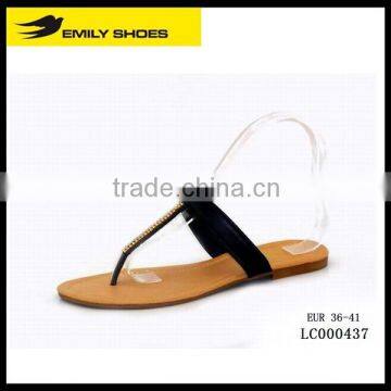 Lady's T-strap slipper with plastic accessory