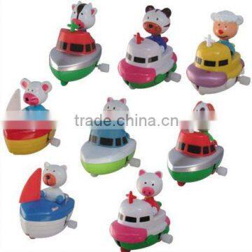 Kids plastic toys Wind up pig by boat