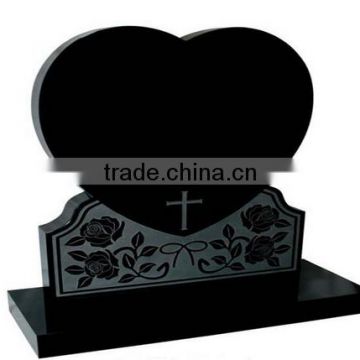 Black granite heart shaped tombstone