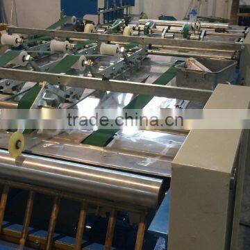 Automatic Woven Sack Cutting Ang Sewing Machine photo-3