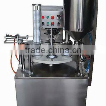 Powder cup filling sealing machine