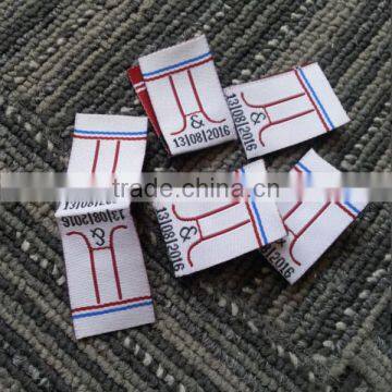 China customized centre fold garments woven labels clothing tags