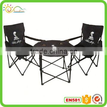 Folding table and chairs for camping.