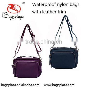 Alibaba China OEM Casual Waterproof Nylon Lady Sling Bag With Leather Trim