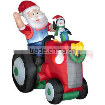 Christmas inflatable santa claus on tractor