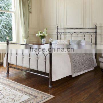 double wrought iron bed in silve