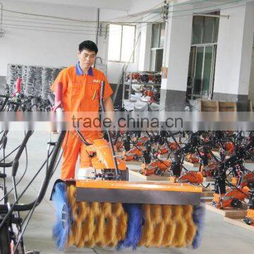 Hydraulic two wheel walking tractor with power sweeper