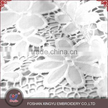 Economical custom design wholesale qmilch embroidery white lace fabric tops for women