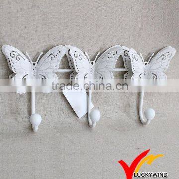 triple white antique metal butterfly hooks for wall