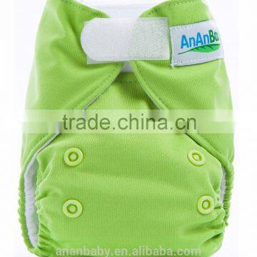 Reusable hook and loop newborn cloth diapers with inserts