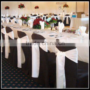 wedding banquet use black chair covers and white romantic chair sashes