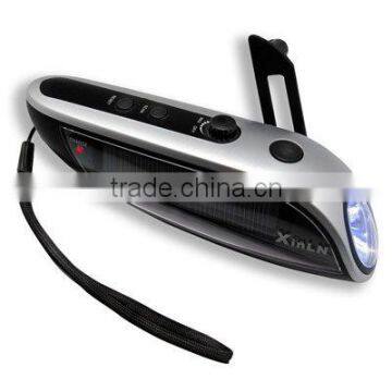 Dynamo hand crank flashlight radio with phone charge