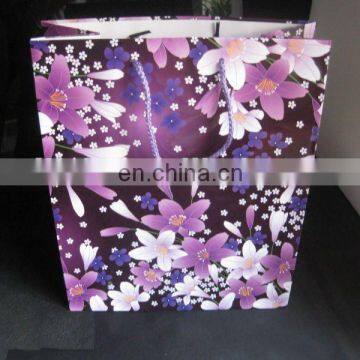 Hot sale recyclable flower design paper gift bag with glitter