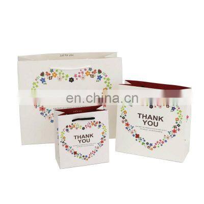 Hot Sale High Quality Customized Fashion Floral Elegant Shopping Gift Paper Tote Bags Thank You Paper Bags With Printed Logo photo-4