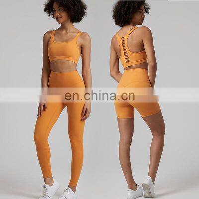 Custom Logo Breathable Sexy Hollow Out Racer Back Sports Fitness Yoga Bra Women Peach Hip Shorts Leggings Workout Gym Suit Set