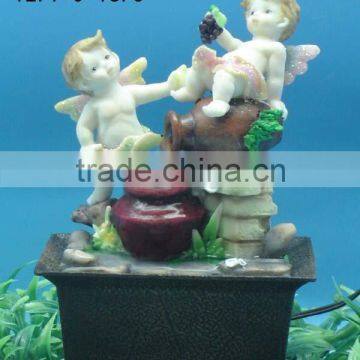 Polyresin cherub w/battery operated fountain