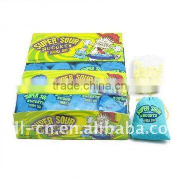 Sour rock shaped chewing gum in a tiny sack