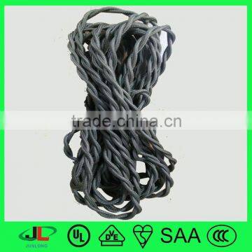 White fabric cord, gray textile twisted power cable, braided twisted wire