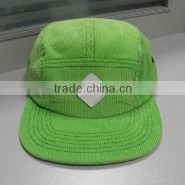 100% cordroy 5-panel camp hat with embossed leather patch