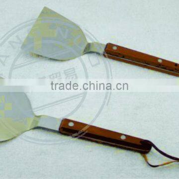 stainless steel cooking shovel with wooden handle