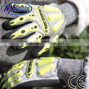 NMSAFETY nylon and glassfibre and HPPE liner coated black nitrile on palm,sandy finish,TPR chips on black,anti-impact gloves