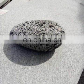 Round tumbled puka lava stone