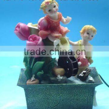 Polyresin children w/battery operated fountain