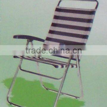 Aluminum folding beach lounge chair with plastic armrest