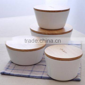 small ceramic rice bowl with wooden cover