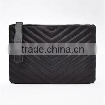 Chevron quilted faux leather clutch