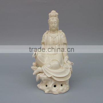 Ceramic sitting female buddha guan Yin statue,Religious buddha statue